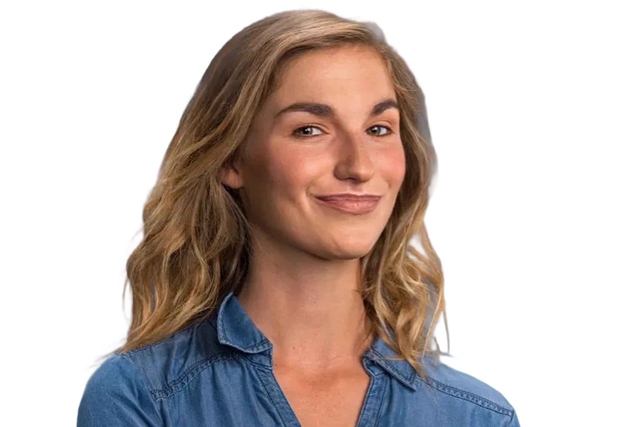 Smiling woman with wavy blonde hair wearing a blue denim shirt.